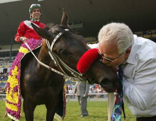June 23, 2002, TORONTO, ON, Canada: Jockey Steven Bahen sits aboard TJ s Lucky Moon as trainer Vito Armata gives him a kiss after winning the 143rd Queen s Plate at Woodbine Racetrack in Toronto on Sunday June 23, 2002. Bahen, who rode 82-1 longshot T J s Lucky Moon to a stunning victory in the 2002 QueenöÄÃ s Plate, retired Monday. STEVEN BAHEN, TJ S LUCKY MOON, VITO ARMATA  - ZUMAc35_ 20020623_zaf_c35_001 Copyright: xFrankxGunnx