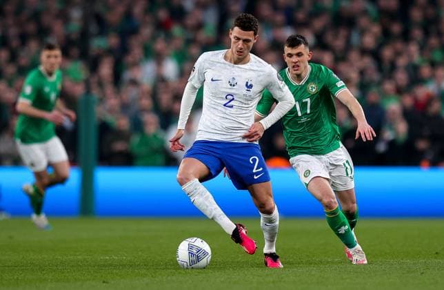 UEFA EURO, EM, Europameisterschaft,Fussball 2024 Qualifying Round Group B, Aviva Stadium, Dublin 27 3 2023 Republic of Ireland vs France France™s Benjamin Pavard with Jason Knight of Ireland Benjamin Pavard with Jason Knight 27 3 2023  Copyright: x INPHO RyanxByrnex RB1_6433