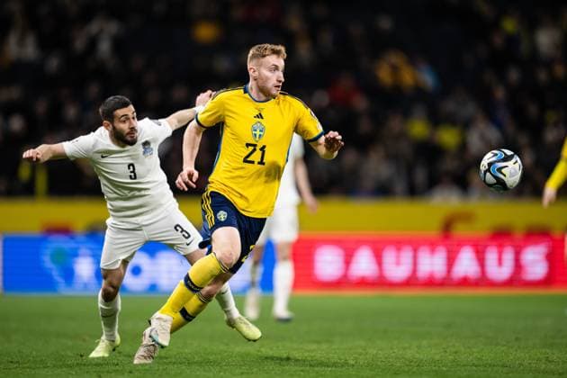 230327 Elvin Jafarguliyev of Azerbaijan and Dejan Kulusevski of Sweden during the UEFA EURO, EM, Europameisterschaft,Fussball Qualifier, EM, Europameisterschaft football match between Sweden and Azerbaijan on March 27, 2023 in Stockholm. Photo: Jesper Zerman BILDBYRAN COP 234 JZ0347 bbeng football soccer fotboll fotball uefa euro qualifier landskamp emkval em-kvalifisering em-kvalik sverige sverige a sweden azerbajdzjan Copyright: JESPERxZERMAN BB230327JZ011
