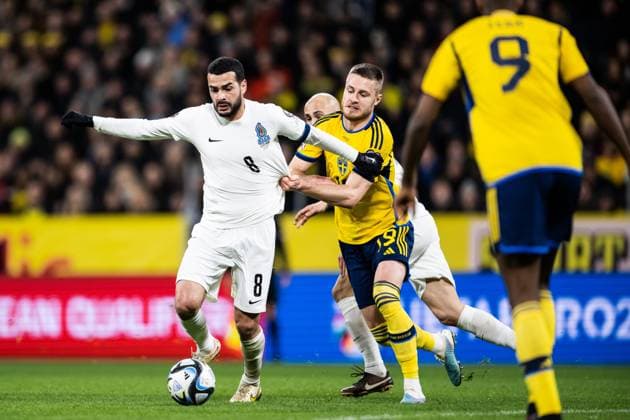 230327 Emin Mahmudov of Azerbaijan and Mattias Svanberg of Sweden during the UEFA EURO, EM, Europameisterschaft,Fussball Qualifier, EM, Europameisterschaft football match between Sweden and Azerbaijan on March 27, 2023 in Stockholm. Photo: Jesper Zerman BILDBYRAN COP 234 JZ0347 bbeng football soccer fotboll fotball uefa euro qualifier landskamp emkval em-kvalifisering em-kvalik sverige sverige a sweden azerbajdzjan Copyright: JESPERxZERMAN BB230327JZ012