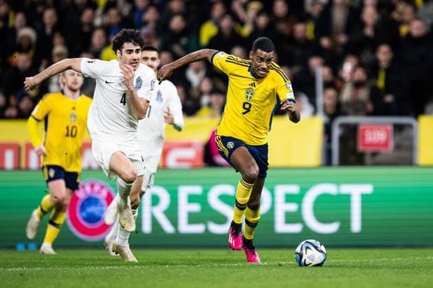 230327 Bahlul Mustafazada of Azerbaijan and Alexander Isak of Sweden during the UEFA EURO, EM, Europameisterschaft,Fussball Qualifier, EM, Europameisterschaft football match between Sweden and Azerbaijan on March 27, 2023 in Stockholm. Photo: Jesper Zerman BILDBYRAN COP 234 JZ0347 bbeng football soccer fotboll fotball uefa euro qualifier landskamp emkval em-kvalifisering em-kvalik sverige sverige a sweden azerbajdzjan Copyright: JESPERxZERMAN BB230327JZ017
