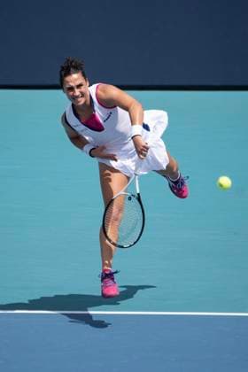 March 27, 2023, Miami Gardens, Florida, United States: March, 27 - Miami Gardens: Martina Trevisan of Italy plays Jelena Ostapenko of Latvia during the round of 16 at the 2023 Miami Open by Itau. Miami Gardens USA - ZUMApa3_ 20230327_zap_pa3_012 Copyright: xAndrewxPatronx