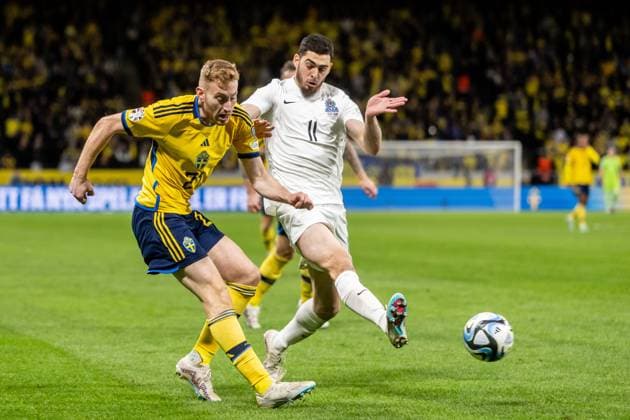 230327 Dejan Kulusevski of Sweden and Ramil Sheydayev of Azerbaijan during the UEFA EURO, EM, Europameisterschaft,Fussball Qualifier, EM, Europameisterschaft football match between Sweden and Azerbaijan on March 27, 2023 in Stockholm. Photo: Maxim Thore BILDBYRAN kod MT JZ0347 bbeng football soccer fotboll fotball uefa euro qualifier landskamp emkval em-kvalifisering em-kvalik sverige sverige a sweden azerbajdzjan Copyright: MAXIMxTHORE BB230327MT052