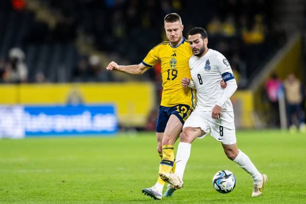 230327 Mattias Svanberg of Sweden and Emin Mahmudov of Azerbaijan during the UEFA EURO, EM, Europameisterschaft,Fussball Qualifier, EM, Europameisterschaft football match between Sweden and Azerbaijan on March 27, 2023 in Stockholm. Photo: Maxim Thore BILDBYRAN kod MT JZ0347 bbeng football soccer fotboll fotball uefa euro qualifier landskamp emkval em-kvalifisering em-kvalik sverige sverige a sweden azerbajdzjan Copyright: MAXIMxTHORE BB230327MT055