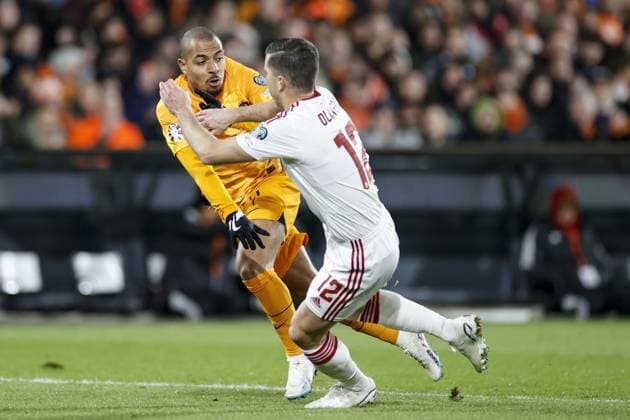 ROTTERDAM , 27-03-2023 , Stadion de Kuip , UEFA Qualification EURO 2024 , season 2022 2023 , match between Netherlands and Gibraltar , (L-R) Netherlands player Donyell Malen, Gibraltar player Jayce Olivero Netherlands - Gibraltar  x20346842x Copyright: