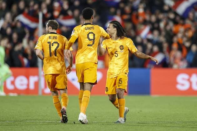 ROTTERDAM , 27-03-2023 , Stadion de Kuip , UEFA Qualification EURO 2024 , season 2022 2023 , match between Netherlands and Gibraltar , (L-R) Netherlands player Daley Blind, Netherlands player Cody Gakpo, Netherlands player Nathan Ake celebrating his goal 3-0 Netherlands - Gibraltar  x20346892x Copyright: