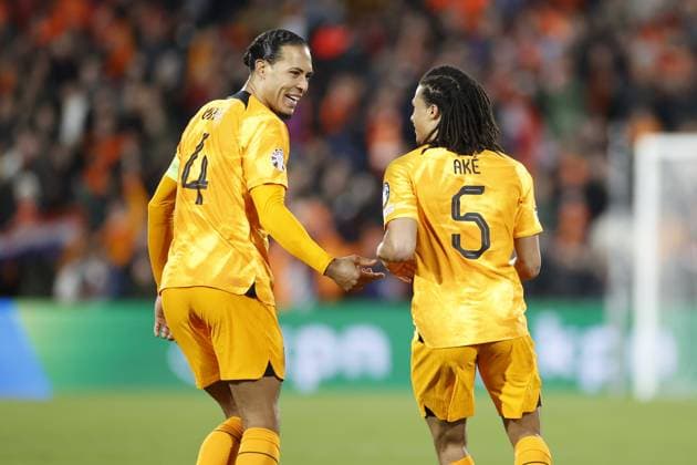 ROTTERDAM , 27-03-2023 , Stadion de Kuip , UEFA Qualification EURO 2024 , season 2022 2023 , match between Netherlands and Gibraltar , (L-R) Netherlands player Virgil van Dijk, Netherlands player Nathan Ake celebrating 2-0 Netherlands - Gibraltar  x20346895x Copyright: