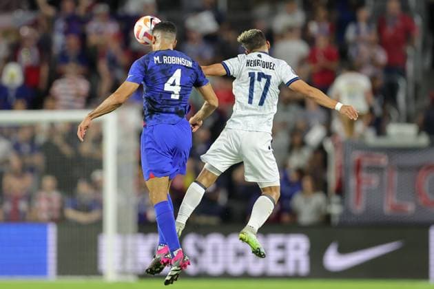 March 27, 2023: United States defender MILES ROBINSON (4) gets a header during the USMNT vs El Salvador Concacaf Nations League match at Exploria Stadium in Orlando, Fl on March 27, 2023. - ZUMAk149 20230327_zsp_k149_025 Copyright: xCoryxKnowltonx