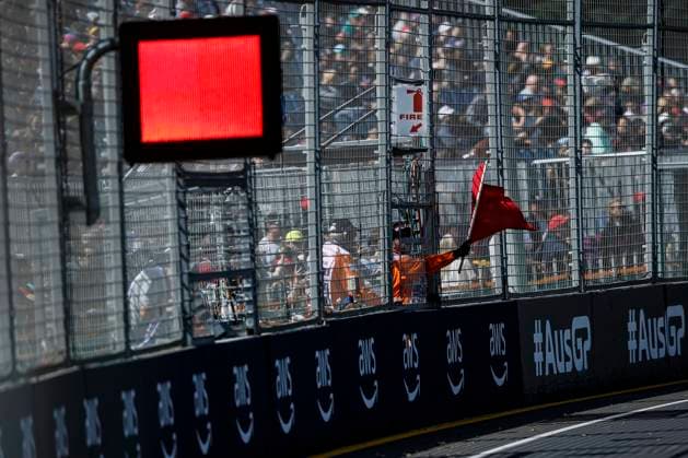 Marshal waves red flag, F1 Grand Prix of Australia at Albert Park Circuit on March 31, 2023 in Melbourne, Australia. (Photo by HOCH ZWEI) Melbourne Australia
