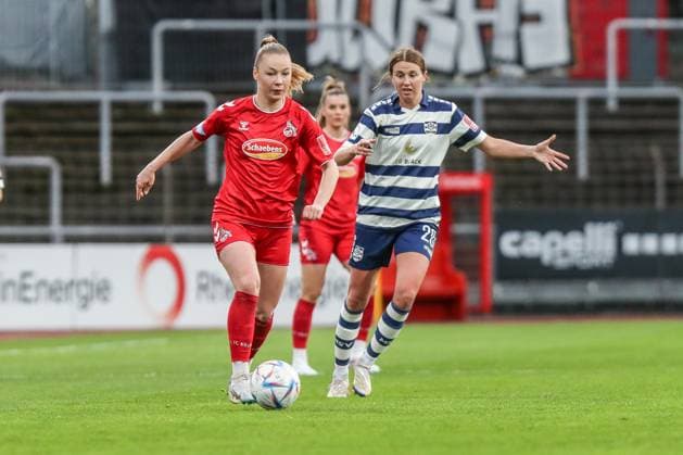 Fussball, FLYERALARM Frauen Bundesliga Saison 2022 2023 17.Spieltag 1.FC Köln - MSV Duisburg 31.03.2023, Südstadion Köln Weronika Zaistowska (1. FC Koeln, 24) Brooke Denesik (MSV Duisburg, 23) Köln Südstadion Nordrhein-Westfahlen Deutschland