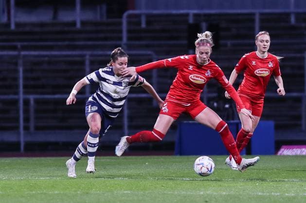Fussball, FLYERALARM Frauen Bundesliga Saison 2022 2023 17.Spieltag 1.FC Köln - MSV Duisburg 31.03.2023, Südstadion Köln Selina Vobian 47 MSV Duisburg) und 1. FC Koeln Köln Südstadion Nordrhein-Westfahlen Deutschland