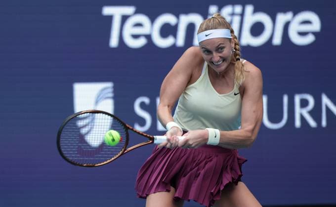 Petra Kvitova from the Czech Republic hits a two handed backhand to Sorana Cirstea from Romania in the women s semi-final match on the stadium court at the Miami Open in the Hard Rock Stadium in Miami Gardens, Florida, on Friday, March 31, 2023. Kvitova defeated Cirstea 7-5,6-4 to advance to the finals.  MIA20230331209 GARYxIxROTHSTEIN
