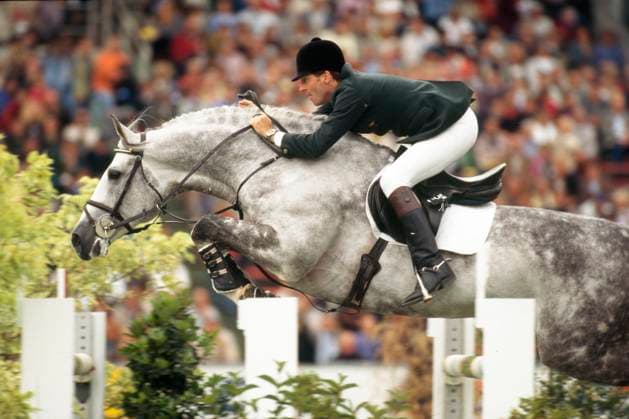 Treor Coyle geb.1.11.1958 ist ein Springreiter aus Irland er siegte im Großen Preis on Aachen 1999 auf seinem aSchimmelhengst Cruising *** Treor Coyle born 1 11 1958 is a show jumper from Ireland he won the Grand Prix of Aachen 1999 on his grey stallion Cruising.