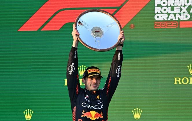 AUSTRALIAN F1 GRAND PRIX, Red Bull driver Max Verstappen of Netherlands celebrate on the podium after winning the 2023 Australian Grand Prix at the Albert Park Circuit in Melbourne, Sunday, April 02, 2023. ( NO ARCHIVING, EDITORIAL USE ONLY, NO USE IN BOOKS WITHOUT CONSENT MELBOURNE VICTORIA AUSTRALIA  Copyright: xJOELxCARRETTx 20230402001782064555