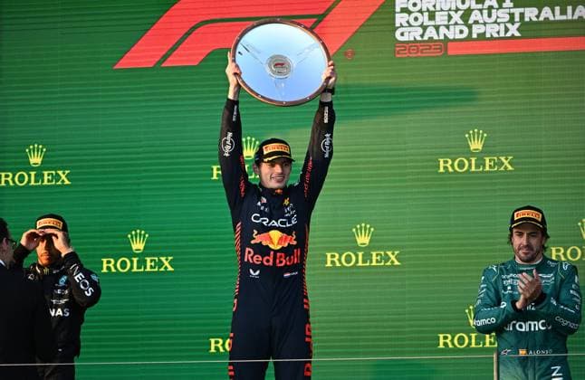 AUSTRALIAN F1 GRAND PRIX, Red Bull driver Max Verstappen of Netherlands celebrates on the podium after winning the 2023 Australian Grand Prix at the Albert Park Circuit in Melbourne, Sunday, April 02, 2023. ( NO ARCHIVING, EDITORIAL USE ONLY, NO USE IN BOOKS WITHOUT CONSENT MELBOURNE VICTORIA AUSTRALIA  Copyright: xJOELxCARRETTx 20230402001782066826