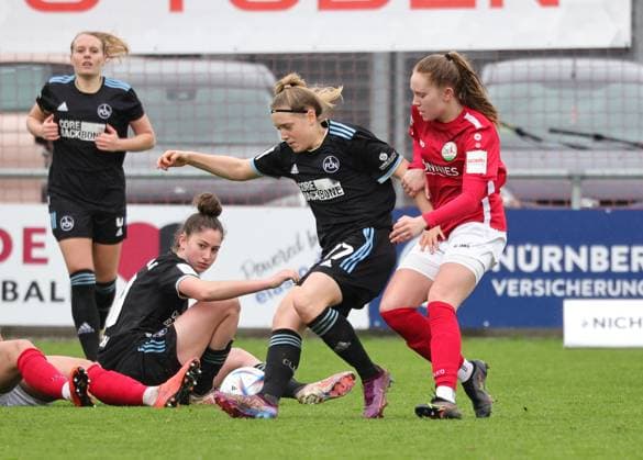 05.03.2023 - Fussball - Saison 2022 2023 - 2. Frauen - Fussball - Bundesliga - 19. Spieltag: 1. FC Nürnberg FCN ( Club ) - FSV Gütersloh 2009 - Sportfoto Zink DaMa - Livia Brunmair (17, 1. FC Nürnberg FCN ) Ronja Leubner (19,FSV Gütersloh )