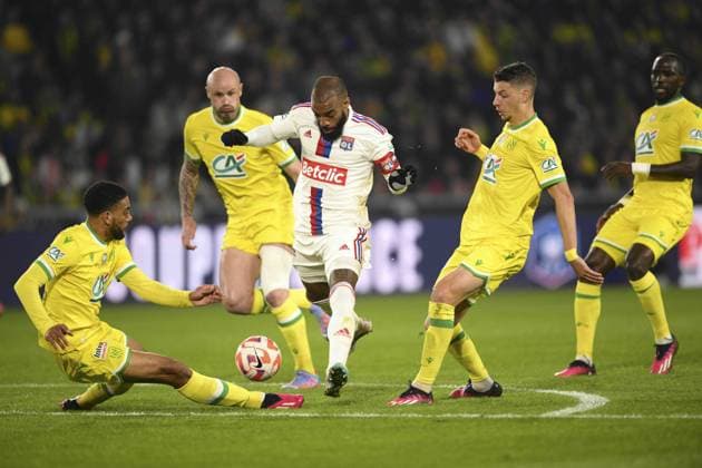 Alexandre Lacazette (OL) vs Andrei Girotto (Nantes) Nicolas Pallois (Nantes) Jean Charles Castelletto (Nantes) FOOTBALL : FC Nantes vs Lyon - 1 2 Finale de la Coupe de France - 05 04 2023 JBAutissier Panoramic 