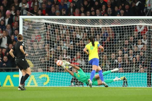 6th April 2023; Wembley Stadium, London, England; Womens Finalissima Football, England versus Brazil; Lucy Bronze of England takes a shot which is saved by goalkeeper Leticia Izidoro of Brazil  ActionPlus12494637 KatiexChan