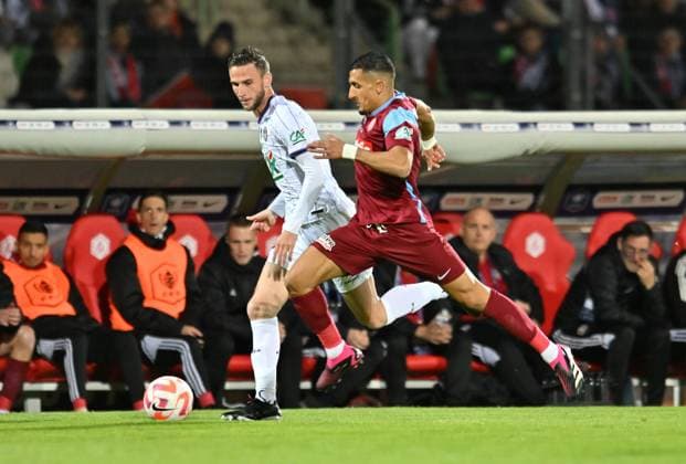 Ahmed Kashi (annecy) vs Branco Van Den Boomen (toulouse) FOOTBALL: FC Annecy vs Toulouse FC - 1 2 Coupe de France - 06 04 2023 FredericChambert Panoramic 