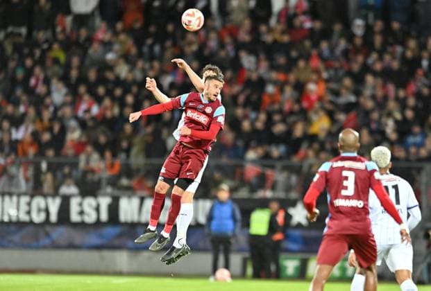 Kavin Testud (annecy) vs Rasmus Nicolaisen (toulouse) FOOTBALL: FC Annecy vs Toulouse FC - 1 2 Coupe de France - 06 04 2023 FredericChambert Panoramic 