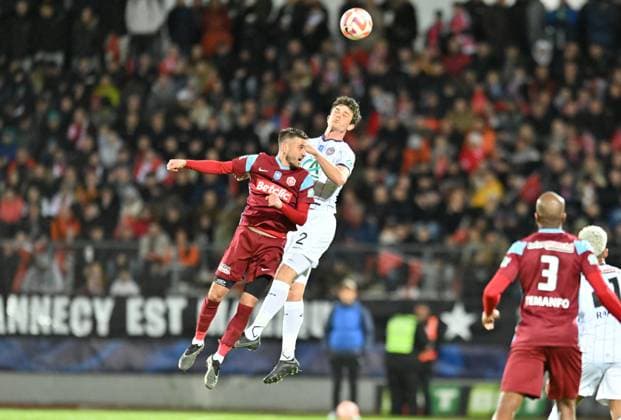 Kavin Testud (annecy) vs Rasmus Nicolaisen (toulouse) FOOTBALL: FC Annecy vs Toulouse FC - 1 2 Coupe de France - 06 04 2023 FredericChambert Panoramic 