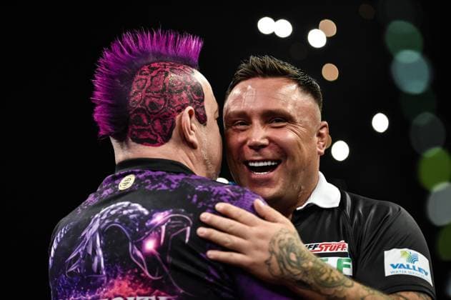 Sport Themen der Woche KW14 Sport Bilder des Tages 6th April 2023, Utilita Arena, Birmingham, England; 2023 PDC Cazoo Premier League Darts Birmingham Night 10; Gerwin Price congratulates Peter Wright (SCO) on his semi final win  ActionPlus12494813 GodfreyxPitt