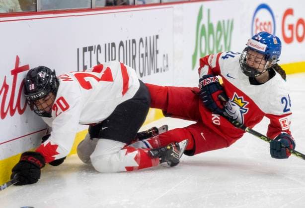 April 7, 2023, BRAMPTON, ON, CANADA: Canada forward Sarah Nurse (20) and Czechia defender Sara Cajanova (24) collide during first period IIHF WomenöÄÃ s World Hockey Championship hockey action in Brampton, Ont., on Friday, April 7, 2023. Canada News - April 7, 2023  - ZUMAc35_ 20230407_zaf_c35_093 Copyright: xFrankxGunnx