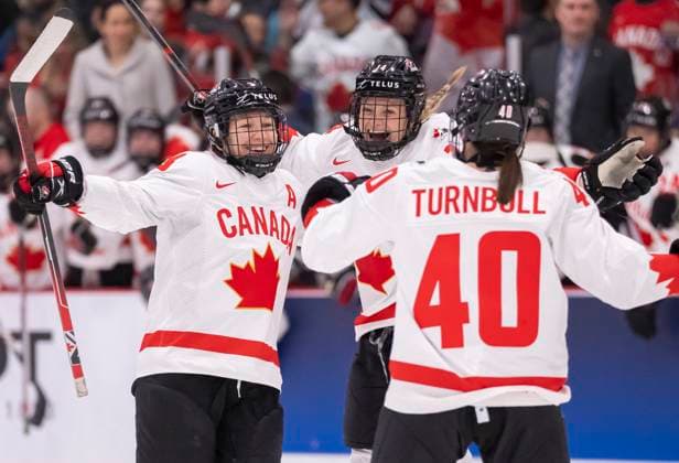 April 7, 2023, BRAMPTON, ON, CANADA: Canada forward Blayre Turnbull (40) and defender Renata Fast (14) congratulate defender Jocelyne Larocque (3) on her goal against Czechia during second period IIHF WomenöÄÃ s World Hockey Championship hockey action in Brampton, Ont., on Friday, April 7, 2023. Canada News - April 7, 2023  - ZUMAc35_ 20230407_zaf_c35_105 Copyright: xFrankxGunnx