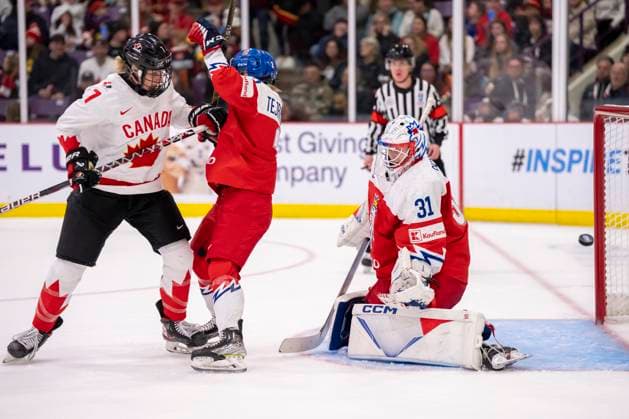 April 7, 2023, BRAMPTON, ON, CANADA: Canada forward Laura Stacey (7) drives through Czechia defender Aneta Tejralova (2) as the puck enters the goal behind Czechia goaltender Blanka Skodova (31) during second period IIHF WomenöÄÃ s World Hockey Championship hockey action in Brampton, Ont., on Friday, April 7, 2023. Canada News - April 7, 2023  - ZUMAc35_ 20230407_zaf_c35_108 Copyright: xFrankxGunnx