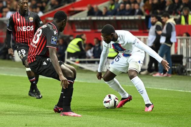 nuno mendes (psg) and ntoine mendy (nice) during OGC Nice vs Paris Saint Germain (PSG), French football Ligue 1 match in Nice, France, April 08 2023  Copyright: xAlessioxTarpini LiveMediax xipa-x xLivexMediax 0 IPA_IPA37201439