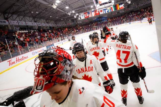 April 8, 2023, BRAMPTON, ON, CANADA: Canada forward Jamie Lee Rattray (47) high fives teammate defender Ella Shelton (17) as the team leaves the ice following their win over Japan in IIHF WomenöÄÃ s World Hockey Championship hockey action in Brampton, Ont., on Saturday, April 8, 2023. Canada News - April 8, 2023  - ZUMAc35_ 20230408_zaf_c35_074 Copyright: xColexBurstonx