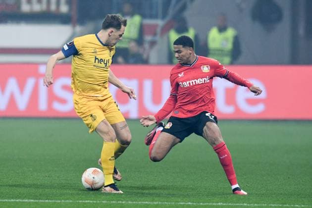 Amine Adli ( Bayer 04 Leverkusen ) im Zweikampf mit Senne Lynen ( Union Saint-Gilloise ). GER, Bayer 04 Leverkusen vs Union Saint-Gilloise, Fussball, Europa League, Viertelfinale Hinspiel, Spielzeit 2022 2023, 13.04.2023 DFL REGULATIONS PROHIBIT ANY USE OF PHOTOGRAPHS AS IMAGE SEQUENCES AND OR QUASI-VIDEO GER, Bayer 04 Leverkusen vs Union Saint-Gilloise, Fussball, Europa League, Viertelfinale Hinspiel, Spielzeit 2022 2023, 13.04.2023 Leverkusen Copyright: xEibner-Pressefoto ThomasxThienelx EP_TTL