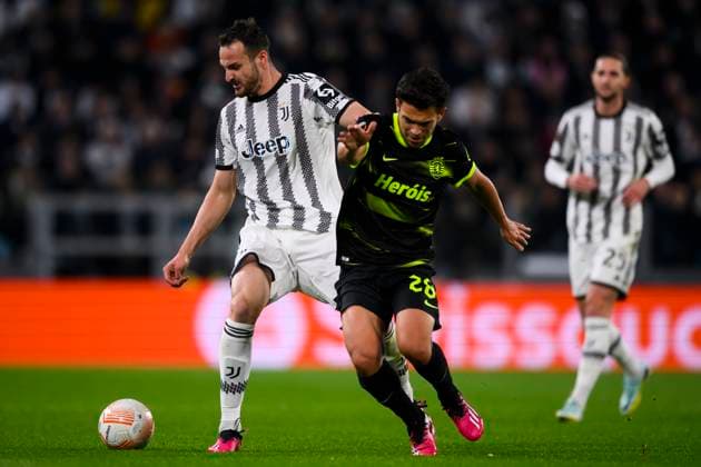 Juventus FC v Sporting CP - UEFA Europa League Federico Gatti of Juventus FC competes for the ball with Pedro Goncalves of Sporting CP during the UEFA Europa League quarterfinal first leg football match between Juventus FC and Sporting CP. Turin Italy Copyright: xNicolòxCampox