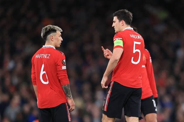 Football - UEFA Europa League - Quarter Final (1st Leg) - Manchester United, ManU v Sevilla 13th April 2023 - UEFA Europa League - Quarter Final (1st Leg) - Manchester United v Sevilla - Harry Maguire of Manchester United and Lisandro Martinez of Manchester United - Photo: Simon Stacpoole Offside. Manchester UK Copyright: xSimonxStacpoolexOffside