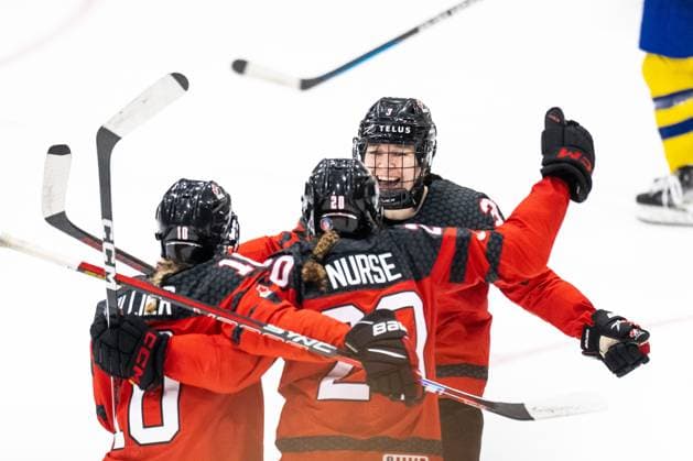 230413 Sarah Fillier, Sarah Nurse and Jocelyne Larocque of Canada celebrate after winning on overtime in the 2023 IIHF Women s World Championship, WM, Weltmeisterschaft quarterfinal game between Canada and Sweden on April 13, 2023 in Brampton. Photo: Mathilda Ahlberg BILDBYRAN kod MA MA0459 ishockey Ice hockey, Eishockey vm dam 2023 iihf womens world championship dam vm ishockey vm kanada sverige women canada sweden bbeng jubel Copyright: MATHILDAxAHLBERG BB230413MA121