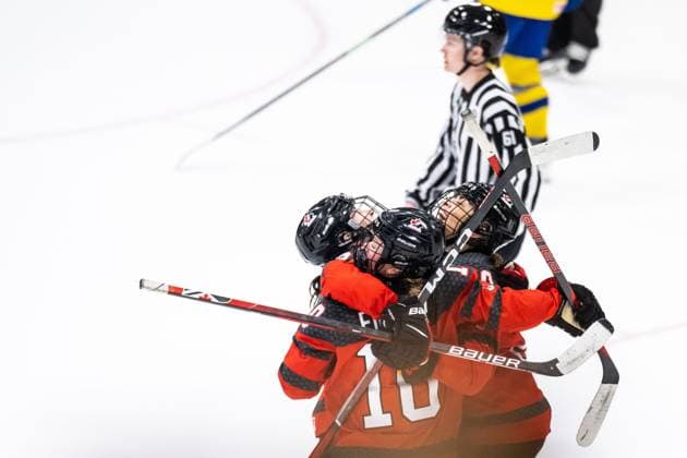 230413 Sarah Fillier, Sarah Nurse and Jocelyne Larocque of Canada celebrate after winning on overtime in the 2023 IIHF Women s World Championship, WM, Weltmeisterschaft quarterfinal game between Canada and Sweden on April 13, 2023 in Brampton. Photo: Mathilda Ahlberg BILDBYRAN kod MA MA0459 ishockey Ice hockey, Eishockey vm dam 2023 iihf womens world championship dam vm ishockey vm kanada sverige women canada sweden bbeng jubel Copyright: MATHILDAxAHLBERG BB230413MA122