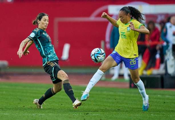 Sara Doorsoun, DFB 23 compete for the ball, tackling, duel, header, zweikampf, action, fight against Aline Amaro, women BRA 26 in the friendly DFB women match GERMANY - BRASIL 1-2 Preparation for WM World Championships 2023 in Australia, New Zealand ,Season 2022 2023, on Apr 11, 2023 in Nuremberg, Nürnberg, Germany.