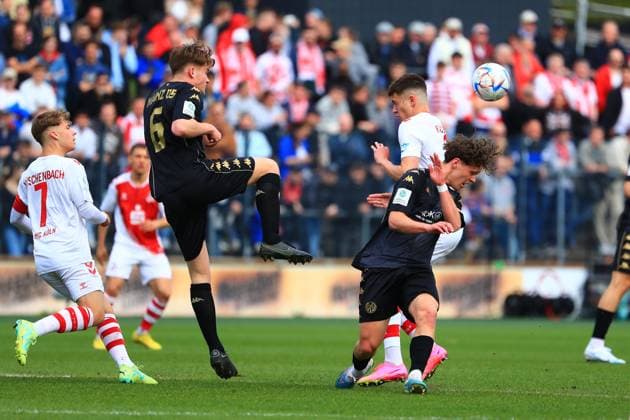 von links: Meiko Waeschenbach (Koeln), Jason Amann (Mainz), Arda Suene (Koeln), Daniel Gleiber (Mainz) 1. FC Koeln vs 1. FSV Mainz 05, Fussball, A-Junioren-Bundesliga, 14.04.2023 DFB regulations prohibit any use of photographs as image sequences and or quasi-video. 1. FC Koeln vs 1. FSV Mainz 05, Fussball, A-Junioren-Bundesliga, 14.04.2023 Koeln