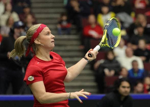 April 15, 2023, Vancouver, British Columbia, Canada: YSALINE BONAVENTURE of Belgium hits the ball back during her match against LEYLAH ANNIE FERNANDEZ of Canada on Day 2 of the Billie Jean King Cup Qualifier match between Canada and Belgium at Pacific Coliseum on April 15, 2023 in Vancouver, British Columba, Canada. Vancouver Canada - ZUMAc132 20230415_zap_c132_015 Copyright: xAndrewxChinx
