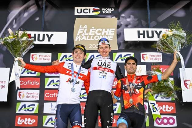 HUY, BELGIUM - APRIL 19 : Pogacar Tadej (SVN) of UAE Team Emirates with Skjelmose Mattias (DEN) of Trek - Segafredo and Landa Mikel (ESP) of Bahrain - Victorious on the podium after the 1.UWT - UCI World Tour 2023 87th La Fleche Wallonne, a race of 194,3 km with start in Herve and finish on the top of the wall of Huy on April 19, 2023 in Huy, Belgium, 19 04 2023 ( Fleche Wallonne 2023 Cycling Race PhotoNews Panoramic 