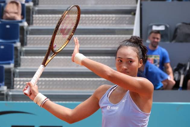 (230428) -- MADRID, April 28, 2023 -- Zheng Qinwen of China reacts during the women s singles round of 64 match against Caty McNally of the United States at the Madrid Open tennis tournament in Madrid, Spain, April 28, 2023. ) (SP)SPAIN-MADRID-TENNIS-MADRID OPEN-WOMEN S SINGLES MengxDingbo 