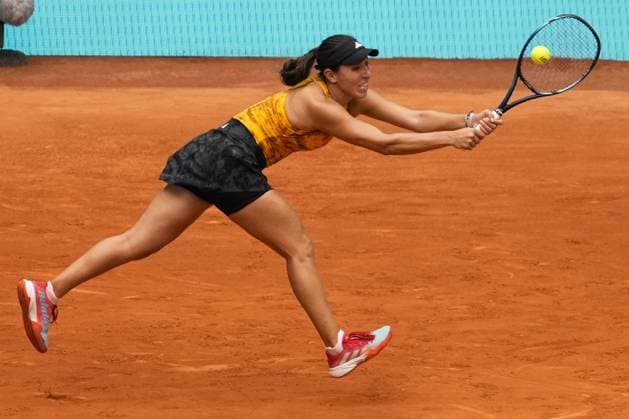 Jessica Pegula returns a shot to Magdalena Frech of Poland during their second round match on day five of the Mutua Madrid Open at the Caja Magica stadium, in Madrid, Spain, on Friday, April 28, 2023.  PDH20230428054 PaulxHanna