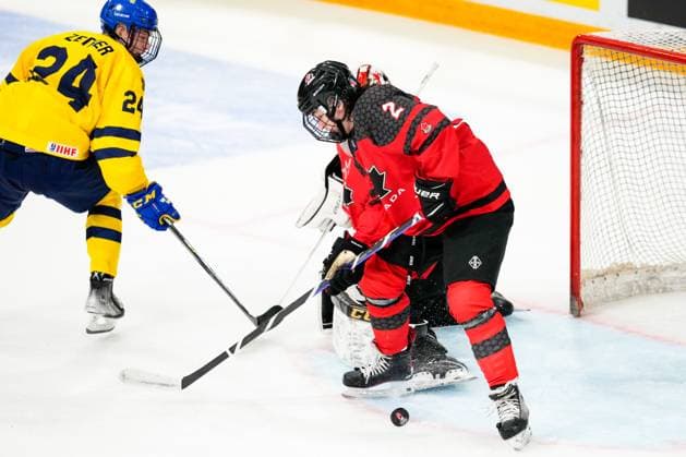BASEL, SWITZERLAND - APRIL 29: Lukas Dragicevic of Canada save this puck during the semi final of U18 Ice hockey, Eishockey World Championship, WM, Weltmeisterschaft match between Sweden and Canada at St. Jakob-Park on April 29, 2023 in Basel, Switzerland. Basel St. Jakob-Park Basel-Stadt Switzerland Copyright: xJustPictures.ch JarixPestelaccix
