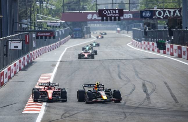 16 LECLERC Charles (mco), Scuderia Ferrari SF-23, action with 11 PEREZ Sergio (mex), Red Bull Racing RB19 during the Formula 1 Azerbaijan Grand Prix 2023, 4th round of the 2023 Formula One World Championship, WM, Weltmeisterschaft from April 28 to 30, 2023 on the Baku City Circuit, in Baku, Azerbaijan - F1 - AZERBAIJAN GRAND PRIX 2023 - RACE DPPI Panoramic  _R3_2381