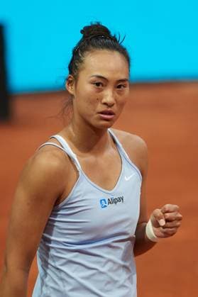 (230501) -- MADRID, May 1, 2023 -- Zheng Qinwen of China celebrates during the women s singles round of 32 match against Ekaterina Alexandrova of Russia at the Madrid Open tennis tournament in Madrid, Spain, April 30, 2023. ) (SP)SPAIN-MADRID-TENNIS-MADRID OPEN-WOMEN S SINGLES MengxDingbo 