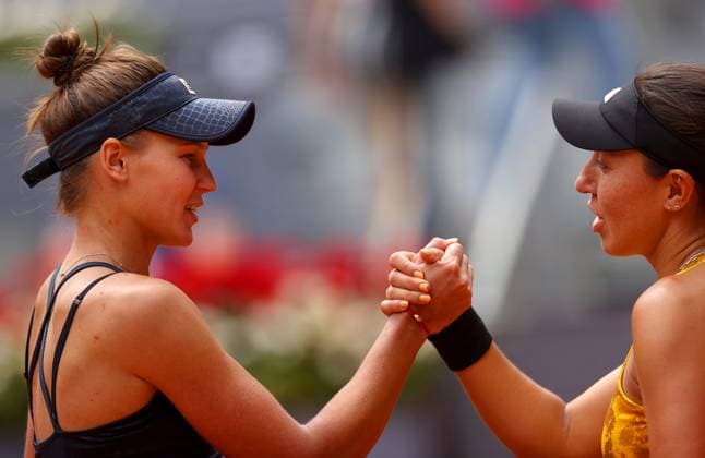Mandatory Credit: Photo by Ella Ling Shutterstock (13895877b) Veronika Kudermatova of Russia shakes hands with Jessica Petula of USA Mutua Madrid Open, Day 10, Tennis, La Caja Magica, Madrid, Spain - 03 May 2023 Mutua Madrid Open, Day 10, Tennis, La Caja Magica, Madrid, Spain - 03 May 2023 Copyright: xEllaxLing Shutterstockx 13895877b
