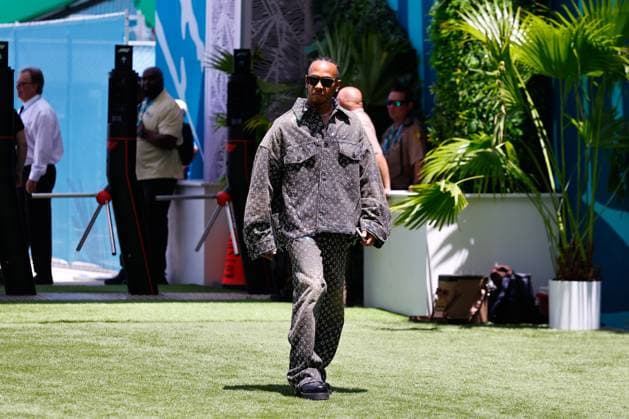 MIAMI GARDENS, FL - MAY 05: Lewis Hamilton 44 of Team Great Britain and Mercedes AMG Petronas Motorsport wearin Louis Vuitton enters the paddock area prior to practice for the F1 Crypto.com Miami Grand Prix on May 5, 2023 at Miami International Autodrome in Miami Gardens, Florida. (Photo by Rich Graessle Icon Sportswire) AUTO: MAY 05 F1 Crypto.com Miami Grand Prix EDITORIAL USE ONLY Icon23050514421