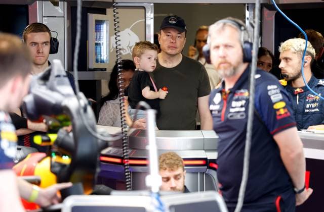 Elon Musk with son X AE A-XII, F1 Grand Prix of Miami at Miami International Autodrome on May 6, 2023 in Miami, United States of America. (Photo by HOCH ZWEI) Miami United States of America
