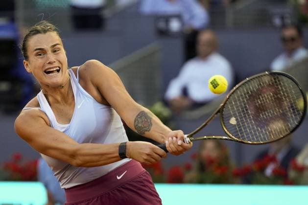 Aryna Sabalenka of Belarus serves a shot to Iga Swiatek of Poland during the final of the 2023 Mutua Madrid Open at the Caja Magica stadium, in Madrid, Spain, on Saturday, May 6, 2023.  PDH20230506018 PaulxHanna