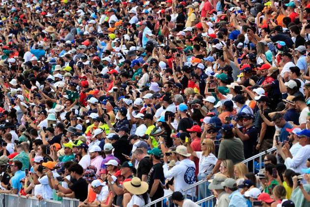 MIAMI GARDENS, FL - MAY 07: Race fans soak up some sun prior to the running of the Formula 1 Crypto.com Miami Grand Prix at Miami International Autodrome in Miami Gardens, FL. (Photo by Jeff Robinson Icon Sportswire) AUTO: MAY 07 F1 Crypto.com Miami Grand Prix EDITORIAL USE ONLY Icon23050733311